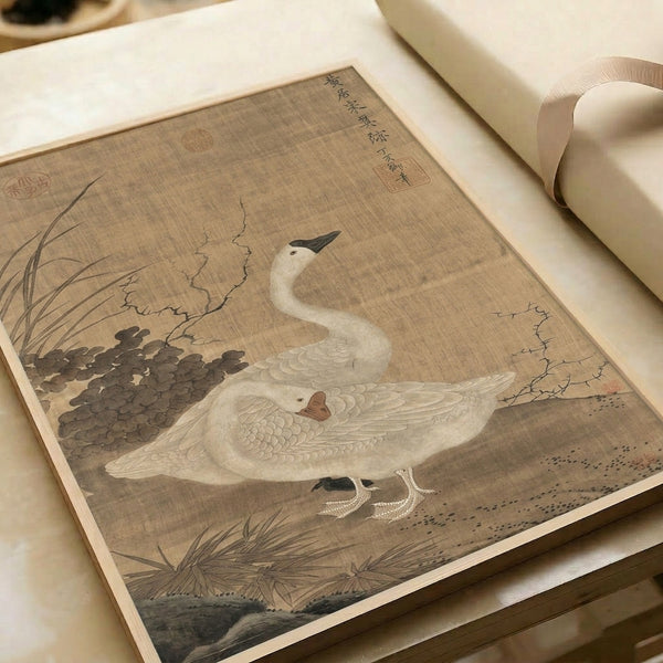 Traditional Japanese crane print framed as wall art, showcasing two birds in reeds with soft cream and brown palette and contemplative naturalistic beauty.