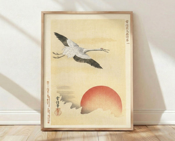 Japanese woodblock print of a crane in flight ascending toward a glowing red sun, rendered in cream, black, and gray tones with contemplative Zen garden aesthetics.