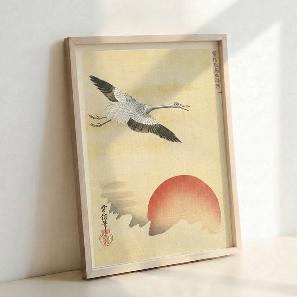 Auspicious crane and red sun composition in Japandi style, a framed print with soft cream and tan background, black brushwork, and meditative mood.