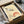 Contemplative Japanese crane artwork with a radiant red sun, framed poster in neutral cream and gray tones, evoking Zen garden tranquility.