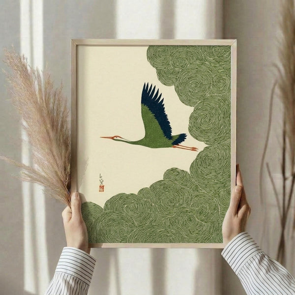 Graceful crane surrounded by soft clouds rendered in traditional woodblock technique with sage and terracotta accents, contemplative zen wall art in frame.
