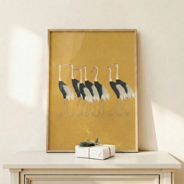 Japanese woodblock-style art print showcasing graceful cranes rendered in soft gold, cream, and charcoal for serene home décor.