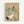 Elegant Japandi art print showing a graceful crane beside pine foliage in traditional woodblock style, combining cream and black with earthy brown and green hues.
