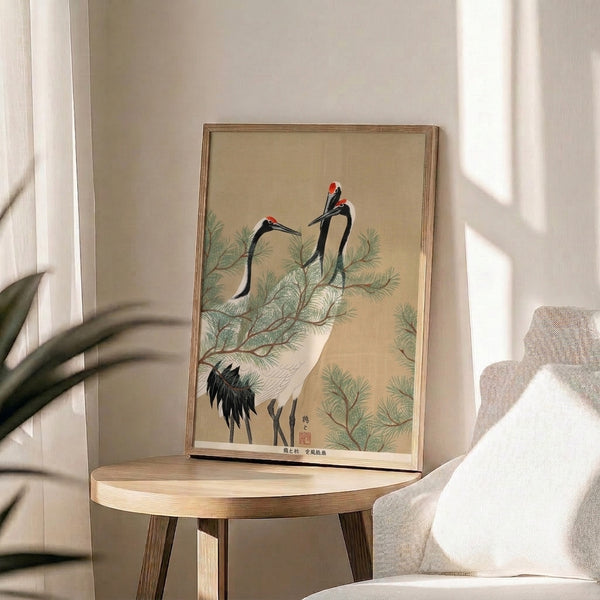 Japandi wall art print of a crane resting on pine, rendered in classic woodblock style with cream, black, muted brown, and green coloring.