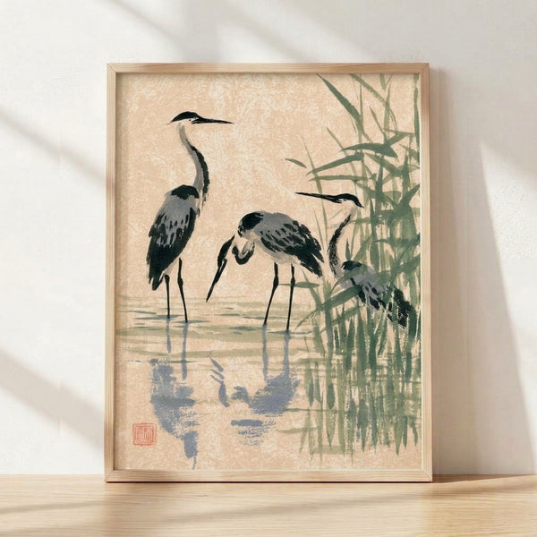 Serene Japanese sumi-e painting of a heron standing in a bamboo marsh, rendered in charcoal black, sage green, and slate blue on cream background, framed as wall art.