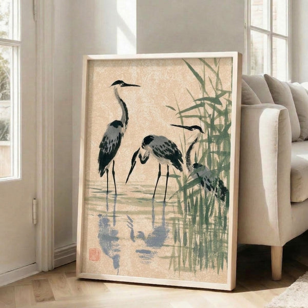 Contemplative ink wash artwork depicting a crane amid swaying reeds and bamboo stalks in muted earth tones and blue-gray hues, displayed as a framed art print.