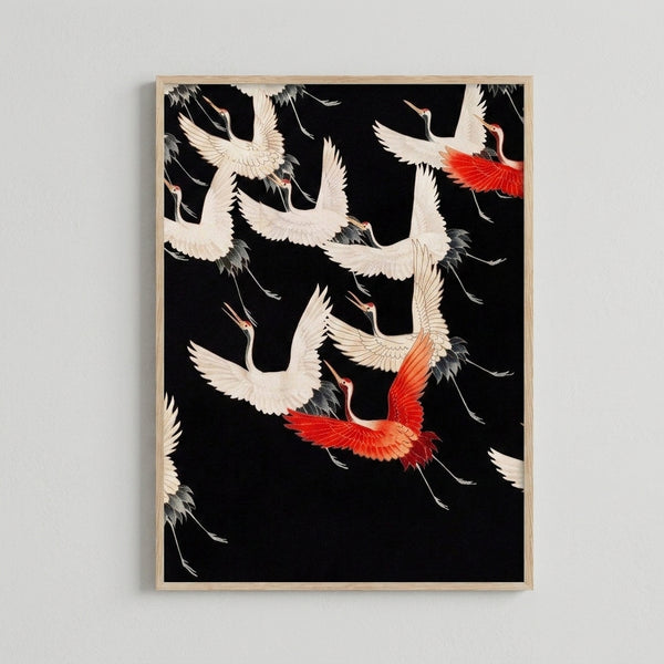 Serene crane wall art in traditional Japanese aesthetic, featuring birds mid-flight rendered in minimal black strokes with warm cream and soft red tones.