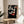 Serene framed poster of flying cranes inspired by Japanese woodblock prints, with graceful linework and a sophisticated palette of black, cream, charcoal, and coral.