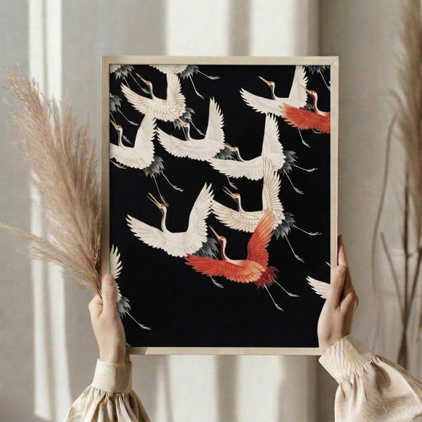 Japandi crane art print displaying multiple birds in elegant flight, executed in minimalist black lines against cream background with subtle red and grey accents.