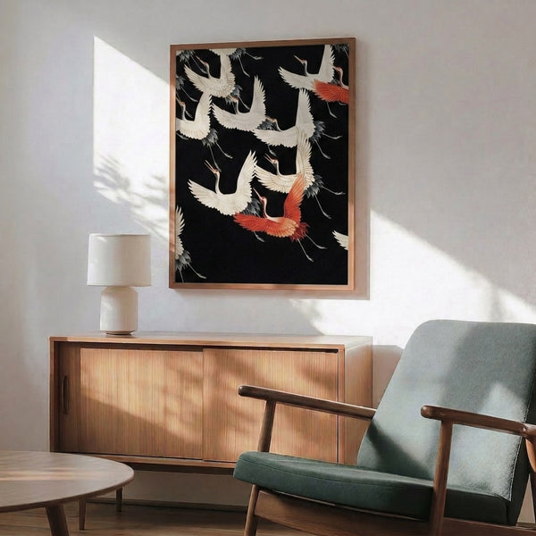 Asian cultural wall art showing cranes mid-flight in traditional Japanese pattern style, rendered in black and cream with charcoal grey and coral red details.