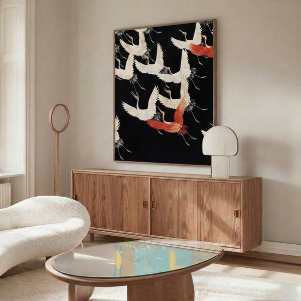 Japanese-inspired bird wall art featuring soaring cranes in elegant flight pattern, illustrated in classic woodblock technique with black, cream, charcoal, and coral tones.