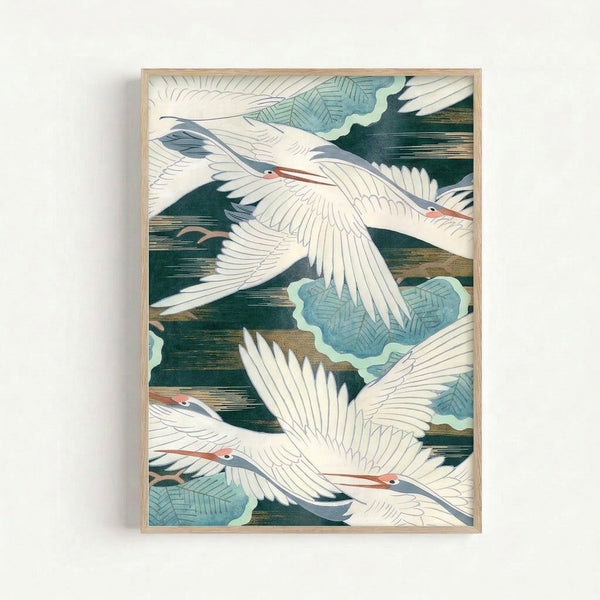 Elegant woodblock art print featuring graceful cranes in flight over water and foliage in soft cream, green, and coral hues.