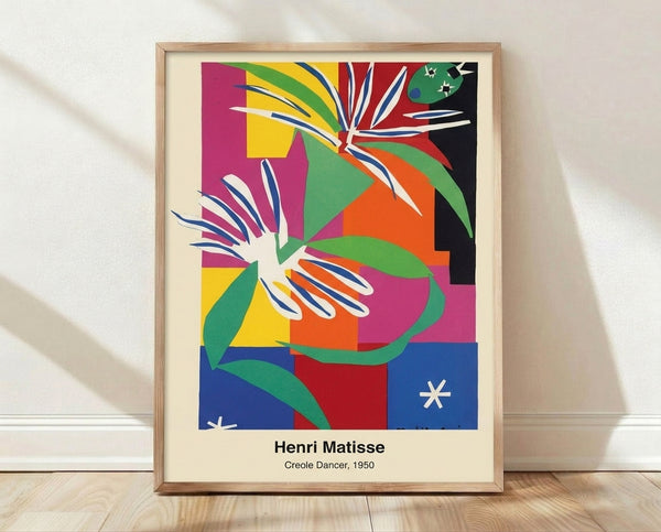 Abstract cut-out style framed poster of a dynamic Creole dancer in vibrant red, blue, and ochre tones with bold black outlines, capturing rhythmic movement and joyful energy.
