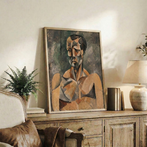 Framed modernist portrait displaying a faceted male bust rendered in muted ochre and green tones with bold black outlines and cubist deconstruction.