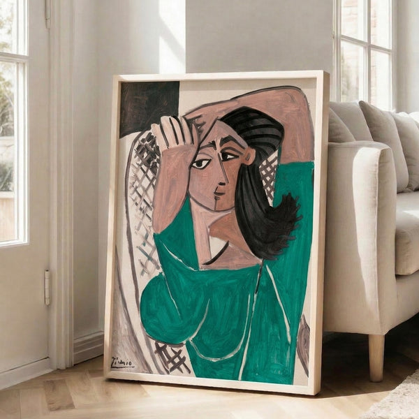 Black linear cubist portrait of a woman rendered in emerald green and cream, minimalist geometric art on a gallery wall.