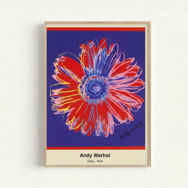 Framed modern flower poster featuring a stylized daisy in bright blue tones against white background, pop art style wall art.