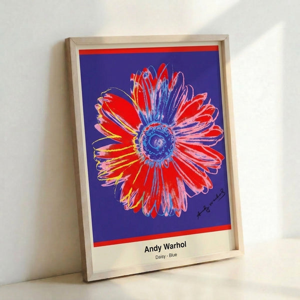 Minimalist pop art daisy design in striking blue and yellow hues with graphic green leaves, contemporary flower print.