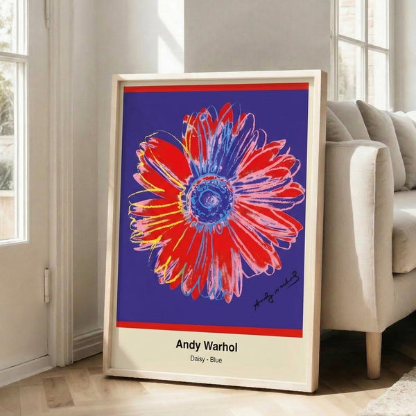 Vibrant Andy Warhol-inspired daisy artwork in bold blue, yellow, and white colors, framed pop culture flower poster.