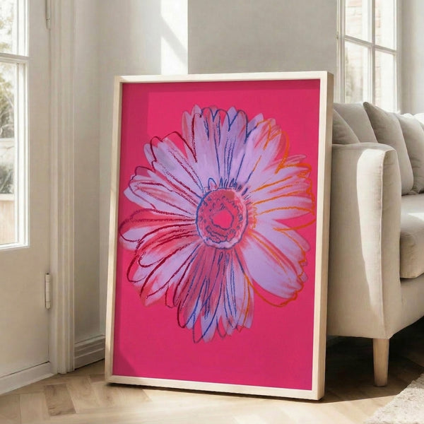Framed pop art daisy poster showcasing a striking pink bloom with warm yellow center, eye-catching floral print in vivid contemporary style.