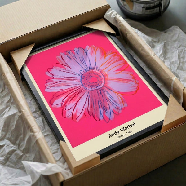 Pop art wall art displaying a cheerful daisy in bright pink and magenta with striking black line work and yellow highlights, perfect for adding whimsical modern color to any space.