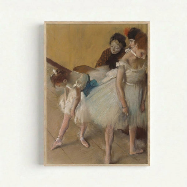 Vintage-style art print showing delicate ballet figures in an impressionistic composition with warm beige and soft ochre hues, evoking classical dance studio ambiance.