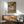 Wall-mounted art print showcasing ballet dancers in a refined study composition, with soft warm coloring and delicate linework creating an atmosphere of focused artistry.
