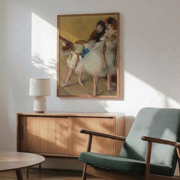 Wall-mounted art print showcasing ballet dancers in a refined study composition, with soft warm coloring and delicate linework creating an atmosphere of focused artistry.