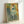 Museum-quality poster showcasing a ballerina in green, featuring the soft light and movement typical of impressionist portraiture and classical dance scenes.