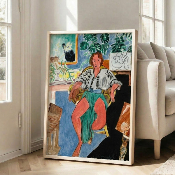 Contemporary framed print showcasing a minimalist dancer figure in relaxed posture, executed in expressive black ink lines against a light canvas.
