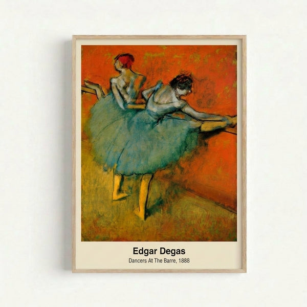 Framed art print of Degas dancers at the barre in contemplative poses, featuring warm ochre and cream hues with touches of pink and blue in an Impressionist style.