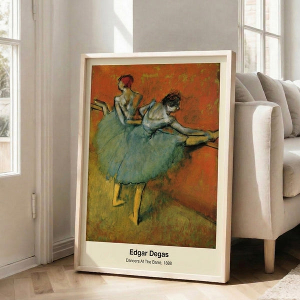 Vintage-inspired Impressionist poster depicting ballet dancers in practice attire at the barre, rendered in serene cream, pink, blue, and ochre tones.