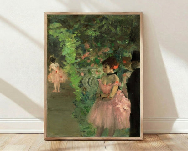 Framed Impressionist poster of ballet dancers in a backstage setting, rendered in soft earth tones and muted colors with delicate brushwork.