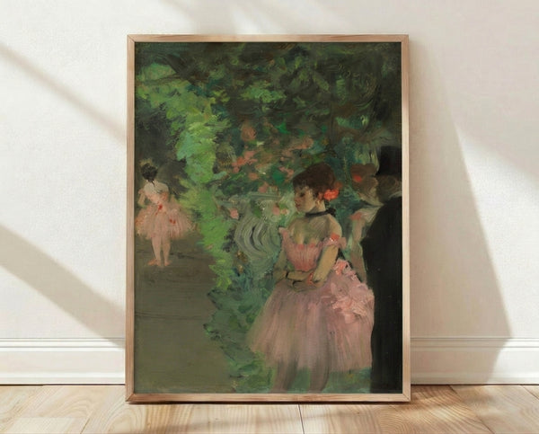 Impressionist painting of ballet dancers in soft pastels, captured in an intimate backstage moment with warm beige and pale pink tones, framed as a poster print on a gallery wall.