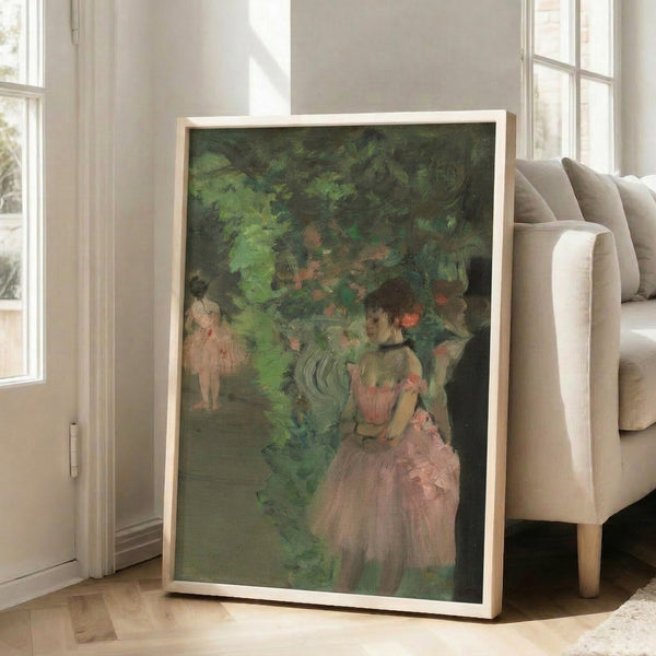 Delicate impressionist scene of rehearsing dancers in soft peachy and cream tones, capturing an intimate theatrical moment, framed as elegant wall art.