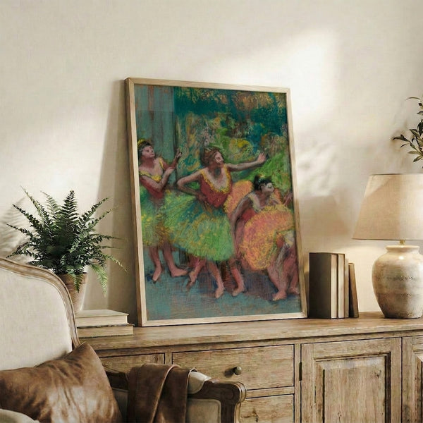 Watercolor-style framed print capturing dancers in a quiet backstage scene, blending soft peachy and gray tones in classic fine art tradition.