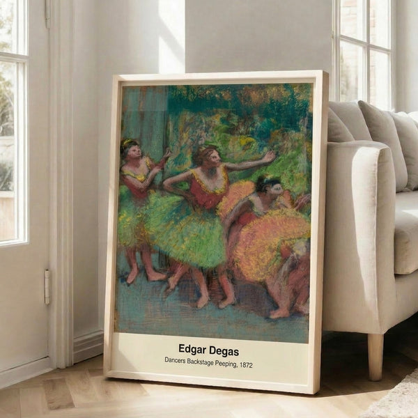 Framed art print depicting graceful dancers with Impressionist technique in subtle cream, brown, and gray tones.