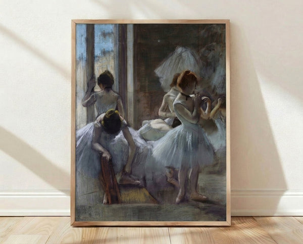Soft pastel artwork of graceful ballerinas in light blue tones, framed and displayed as a wall art print in classic Degas style.