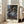 Contemplative impressionist portrait of a woman dancer bathed in soft pastel hues of blue and ochre with subtle silhouette shadows; wall-mounted art print.