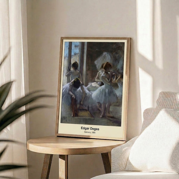 Ballerina study rendered in impressionist soft pastels featuring gentle blues and ochre accents with silhouette contrasts; vintage-style framed print on wall.