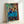 Vintage-style ballet poster featuring dancers dressed in blue, rendered in soft impressionist brushwork with a contemplative, tranquil mood.