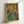 Soft impressionistic poster showcasing dancers in flowing poses, dominated by gentle pink and verdant green colorways.