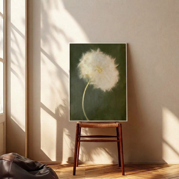 Delicate watercolor painting of a dandelion with wispy seeds in pale yellow and white against sage green background, embodying zen-like simplicity.