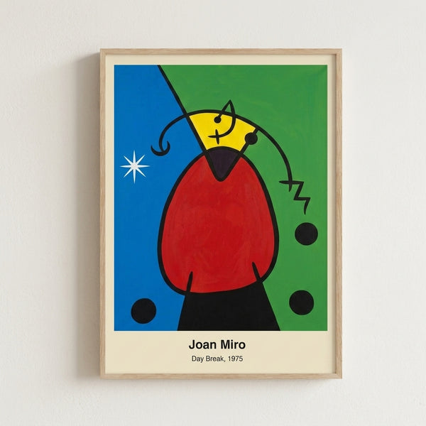Framed modern art print with Miro's Day Break composition: floating abstract forms and a bold red orb suggesting sunrise, rendered in a contemplative color field style.