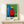 Modern abstract wall art featuring Miro's Day Break with organic geometric forms and a striking red sun against a white background, evoking ethereal morning light.
