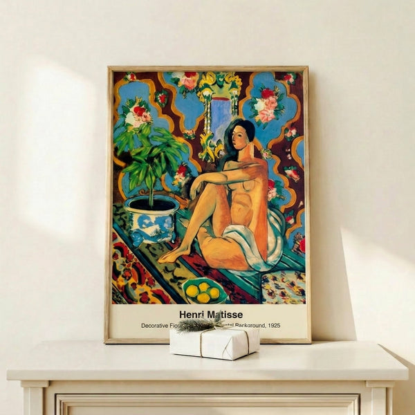 Framed Matisse artwork depicting a reclining woman surrounded by luxurious patterned rugs and textiles in a sophisticated palette of teal, gold, and earthy tones.
