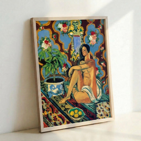 Wall-mounted art print displaying a figure surrounded by elaborate ornamental designs in a flat, decorative style characteristic of early modern art movements.
