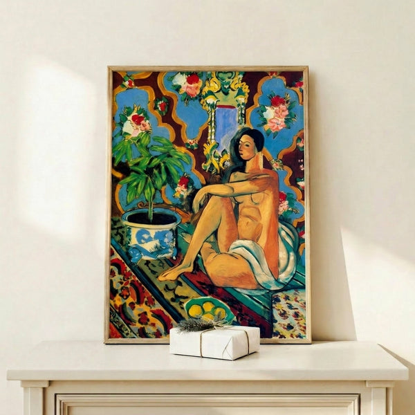 Framed gallery print of a poised figure positioned within a richly patterned ornamental composition, showcasing bold color and abstract form.