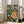 Decorative art poster featuring a graceful figure against a complex ornamental background, executed in the vibrant, pattern-forward style of modernist design.