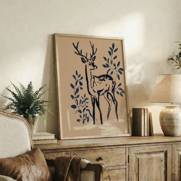 Japandi-inspired framed art showing a serene deer among botanical elements rendered in clean lines with navy and cream coloring.
