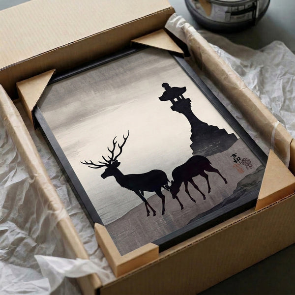 Japandi-aesthetic framed poster showing a peaceful deer beside an ornamental lantern with water and mountain elements in restrained grayscale palette.